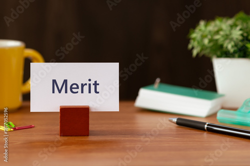 Photos There is word card with the word Merit