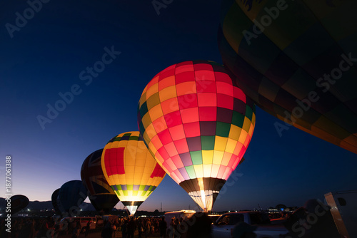 Hot air balloons glowing during the Dawn Patrol at Albuquerque Balloon Fiesta
