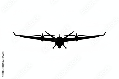 Silent Sentinel: The stark silhouette of a modern unmanned aerial vehicle (UAV), also known as a drone, cutting a striking figure against the sky. 