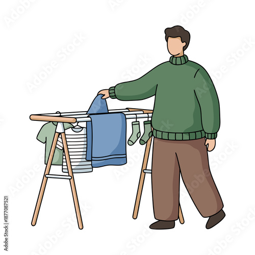 Man hanging laundry on a drying rack at home.
