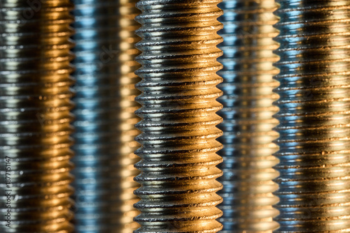 Quadro em tela Rows of Threaded Steel Bolts Background