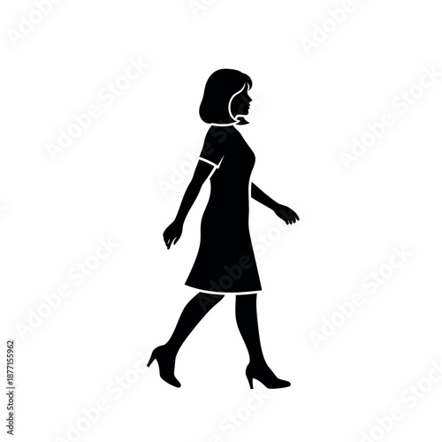 Woman walking in silhouette.