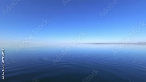 mistreat. A perfectly flat lake mirroring the sky with a seamless horizon. travel magazines, destination branding, designed for outdoor magazines and nature guides and travel destination branding.