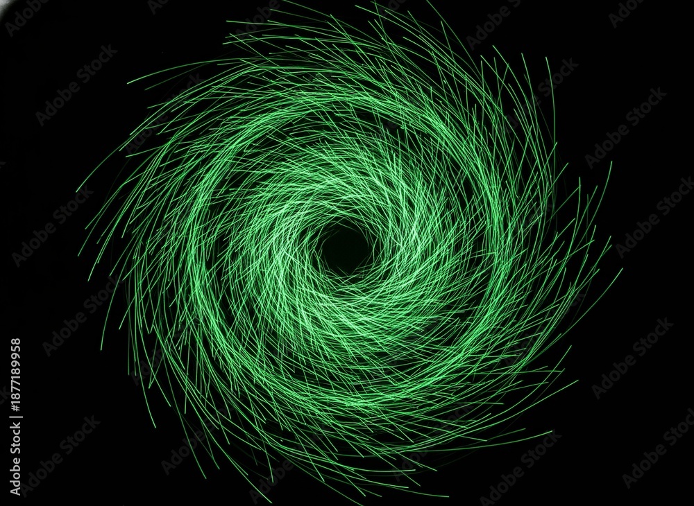 Fototapeta premium Vibrant green swirling light pattern on black background