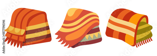 Three distinct patterned blankets in warm colors isolated on white