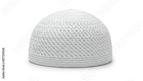 Knitted white prayer cap with textured pattern, isolated, viewed from the front