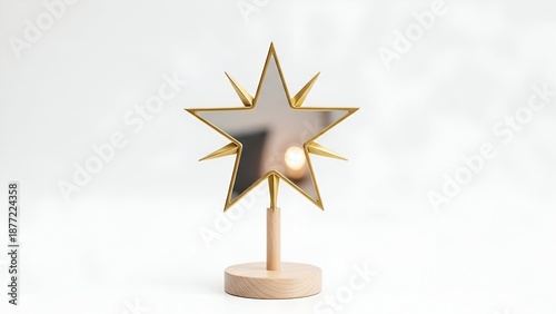 Gold star mirror decor on minimalist stand, isolated, viewed from the front