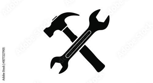 A striking black silhouette depiction of a hammer and wrench crossed representing tools and repair silhouette