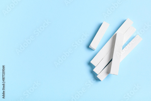 Pieces of white chalks on b...