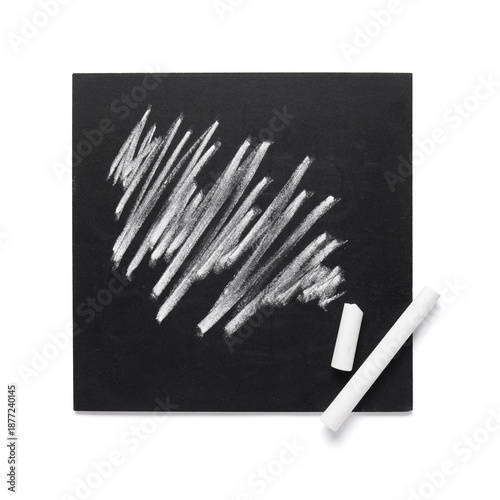 Chalkboard with chalks on w...