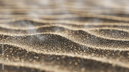 close up of shimmering black sand dunes with golden light highlights and gentle waves