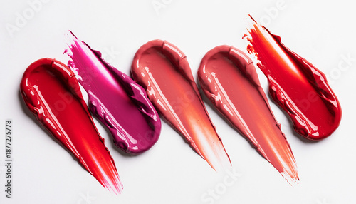 Vibrant swatches of various lip color shades on white background