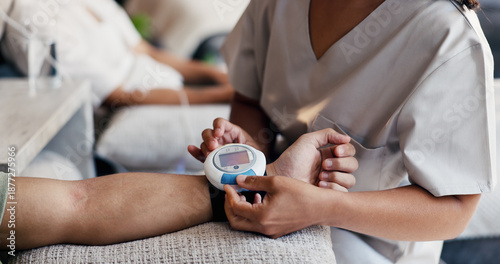 Photos Nurse, hands or checking with blood pressure monitor for healthcare checkup, exam or assessment