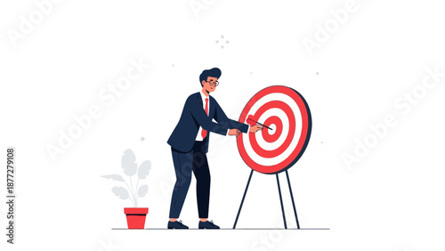 Businessman hitting bullseye on target board, achieving business goals and success concept