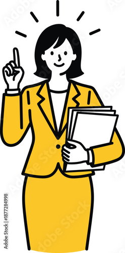 Smiling businesswoman in a yellow suit pointing upwards having a brilliant idea while holding documents.