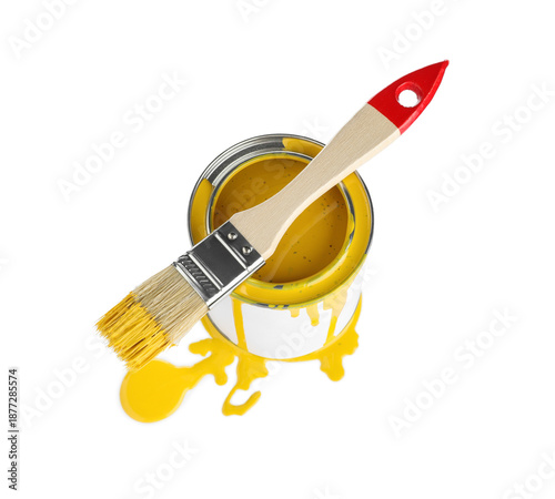 Can of yellow paint with br...