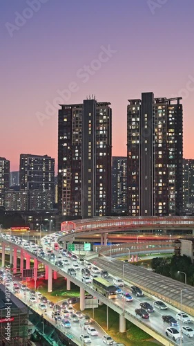 The busy road traffic on the main roads of Shenzhen city at dusk
