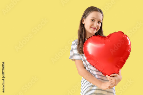 Cute little girl with heart...