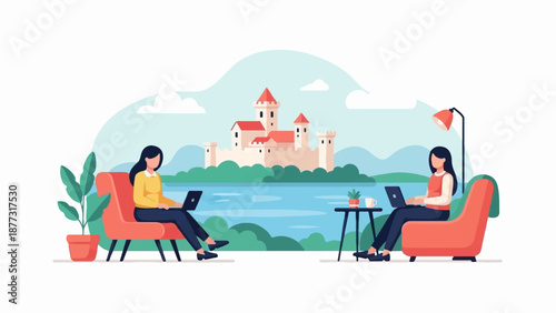 Two women work on laptops near a lake with a castle in the background