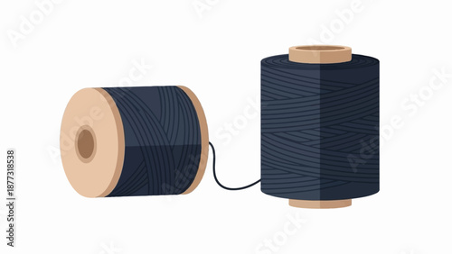 Two spools of dark thread connected by a thin string