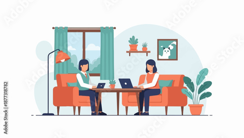 Two people working on laptops in a cozy living room