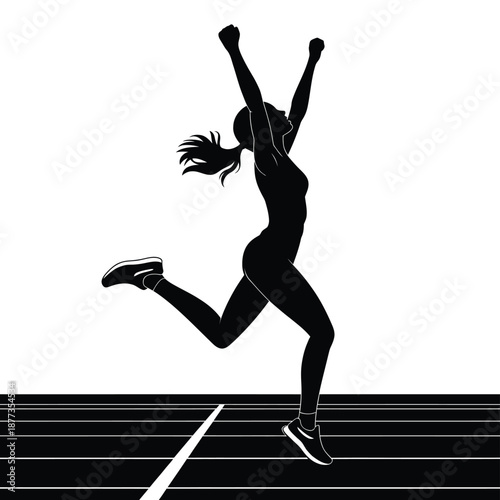 a woman jumping in the air with her arms raised