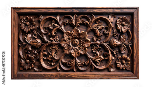 Ornate floral wood carving in a rectangular frame, detailed and textured