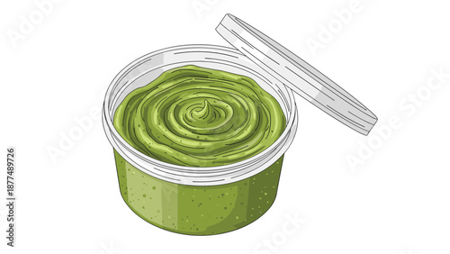 Small plastic tub filled with smooth and creamy green spread like wasabi, pesto, or avocado dip with its lid placed nearby.