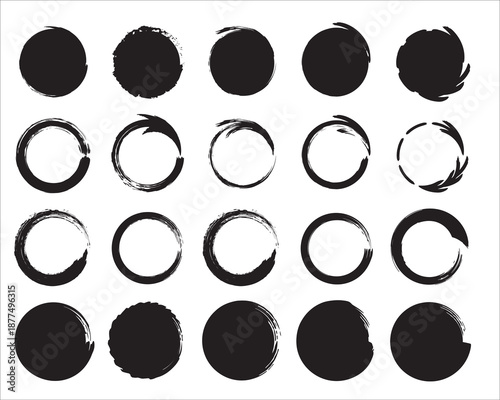 A grid of 20 black and white circles with varying opacity and texture