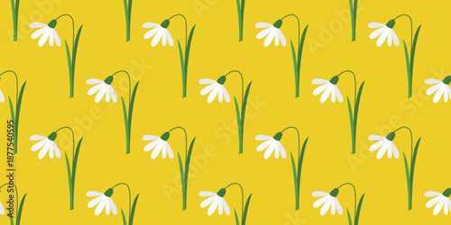 Snowdrops on yellow background seamless pattern. Bright floral print for textiles, packaging, wallpaper, tiles, and design, vector graphic