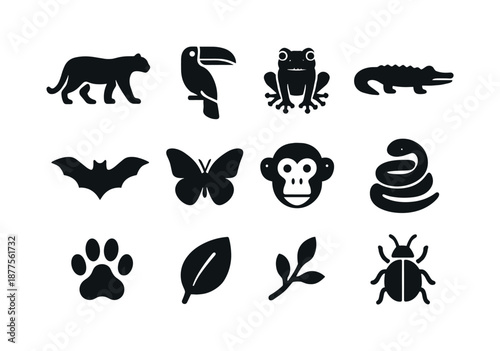 Jungle Wildlife Icons. Jungle wildlife. Solid icon set of jungle wildlife: jaguar silhouette, toucan silhouette, tree frog, crocodile silhouette, bat