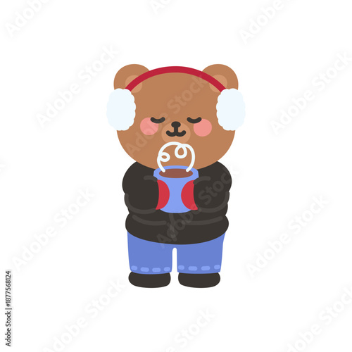 A cute bear enjoying a warm drink