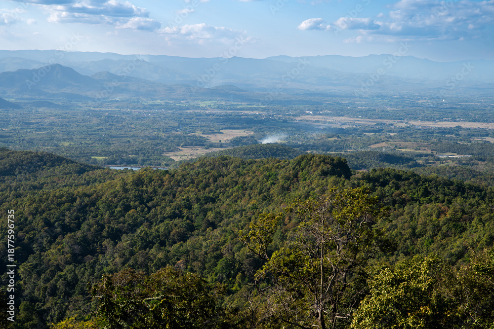 Obraz premium Green mountain landscape under blue sky with scenic viewpoint symbolizing freedom, travel, relaxation and deep connection with nature, 4k video footage
