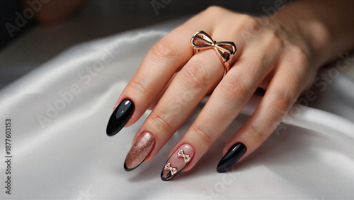 Woman hand with black and pink nails and bow ring on finger jewelry transparent background