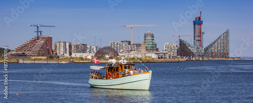 Tableau sur toile Panorama of a boat taking tourists on a tour in the harbor of Aarhus, Denmark