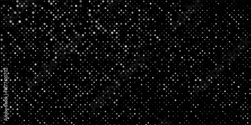 Simple, abstract background of scattered white dots on black, representing either falling snow at night or a starry sky
