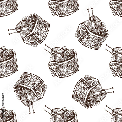 Hand drawn vintage seamless pattern of wicker basket with yarn balls and knitting needles monochrome illustration