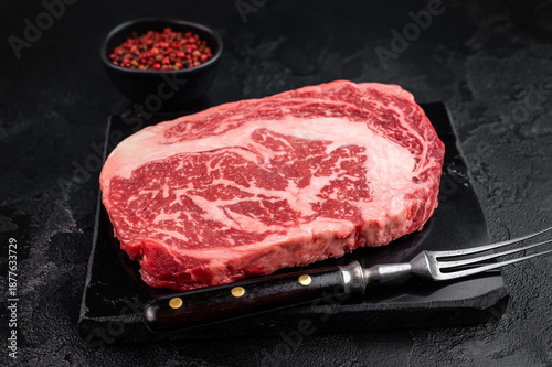 Принти на полотні Fresh raw ribeye beef steak, marbled rib fillet cut, premium red meat for grilli