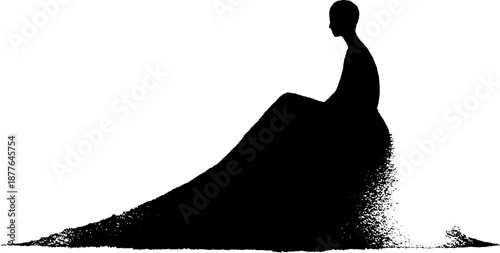 Silhouette of seated female with long flowing dress