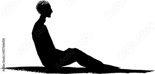Silhouette of a seated figure in thoughtful pose