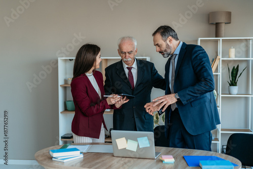 Senior Businessman with Son and Daughter in Modern Office – Family Business Transition