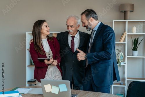 Senior Businessman with Son and Daughter in Modern Office – Family Business Transition