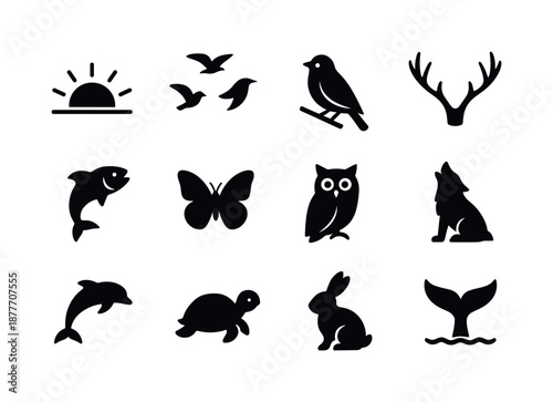 Wildlife Silhouettes Collection. Sunrise and sunset. Solid icon set of wildlife silhouettes: flying birds, perched bird, deer antlers, fish jump, butterfly,