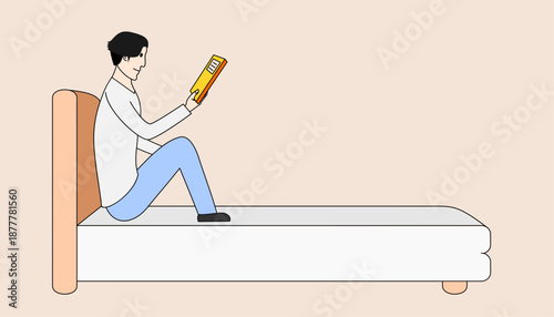 A man is reading a book on a bed