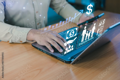 Quadro em tela Businessman using laptop with employee benefits icons