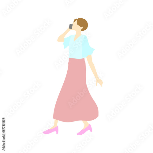 スマホで通話しながら一人で歩く春服、ロングスカートの女性