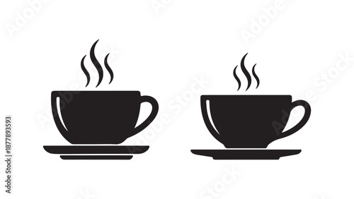 Two steaming cups of coffee on saucers
