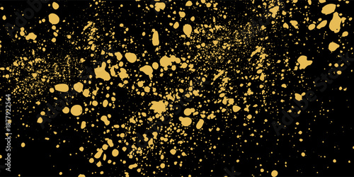 Gold glitter texture on a black background. Holiday background. Golden explosion of confetti. Golden grainy abstract  texture on a black  background.