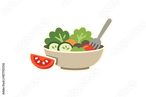 Healthy salad in a bowl with a slice of tomato and fork