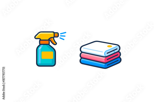 Cleaning spray bottle and folded towels, hygiene concept